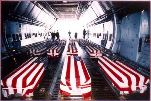  photo iraq-flag-draped-coffins_zps2e9f61ea.jpg